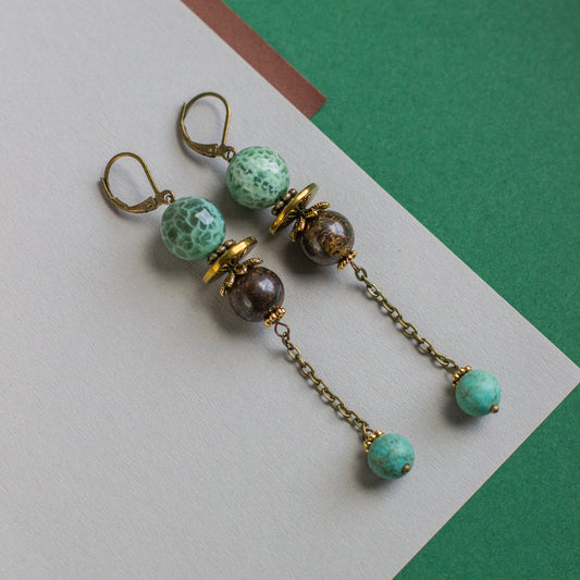 These simple yet beautiful green and brown dangle earrings are a perfect accent for any occasion, and a great gift idea.