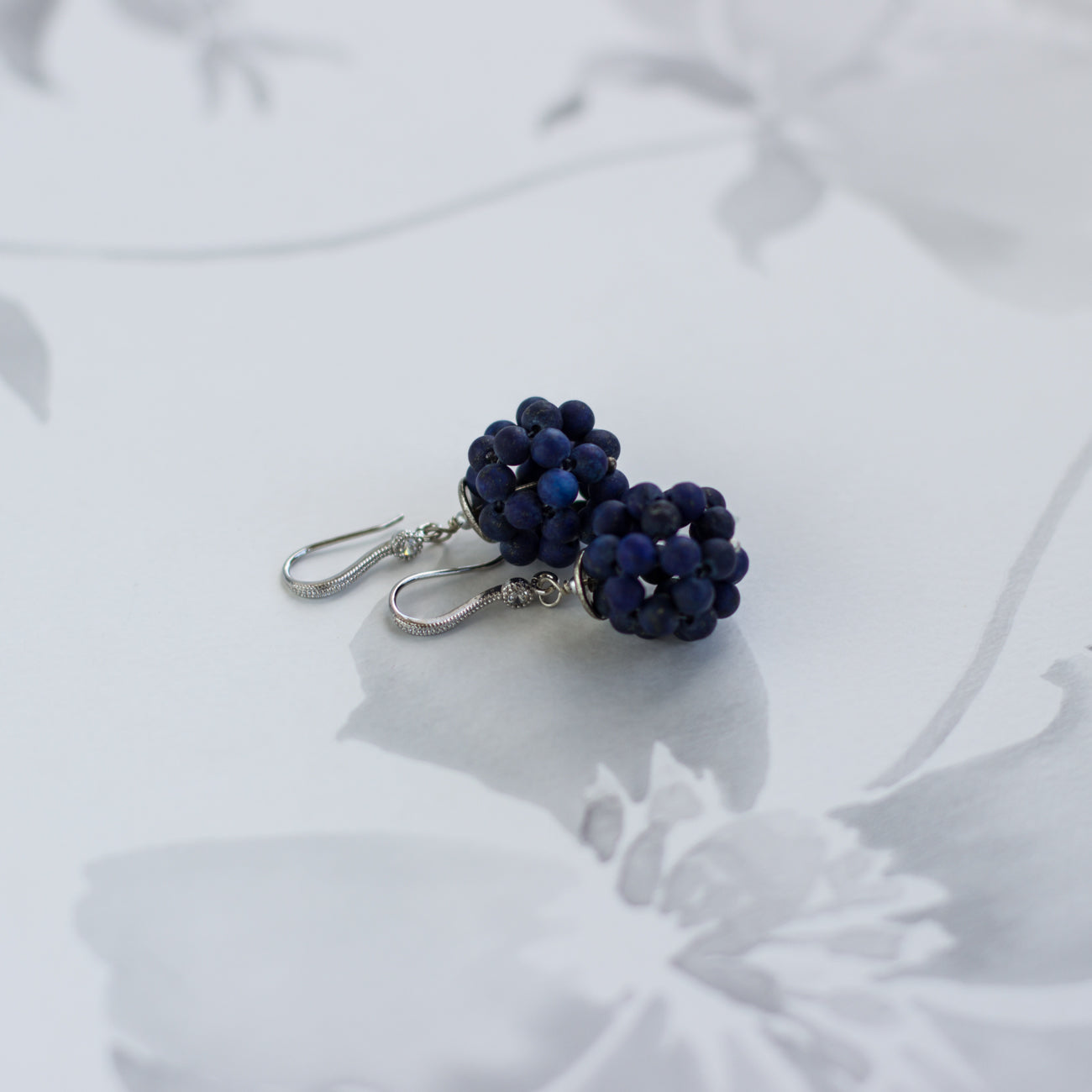 Shop for natural stone royal blue earrings featuring lapis lazuli. Handmade bubble lazurite earrings. Perfect for any occasion, adding a touch of elegance to your outfit. Great gift idea.
