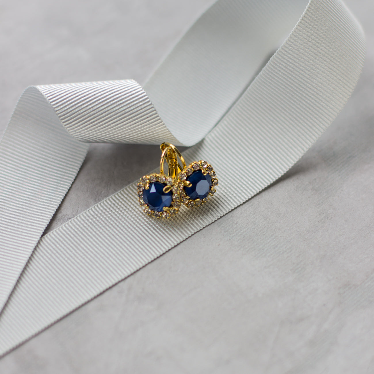 Small crystal earrings. Royal blue jewelry. Gold crystal earrings. Swarovski accessories. 
