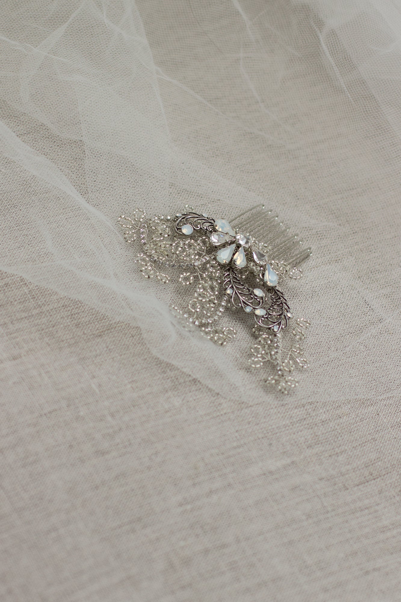 Shop online handmade wedding bridal hair accessories. Crystal Bridal hair comb decorated with stylized leaves and twigs. One of a kind Wedding headpiece. Crystal hair comb. Rhinestone hair comb. Silver headpiece. Wedding hair fascinator.