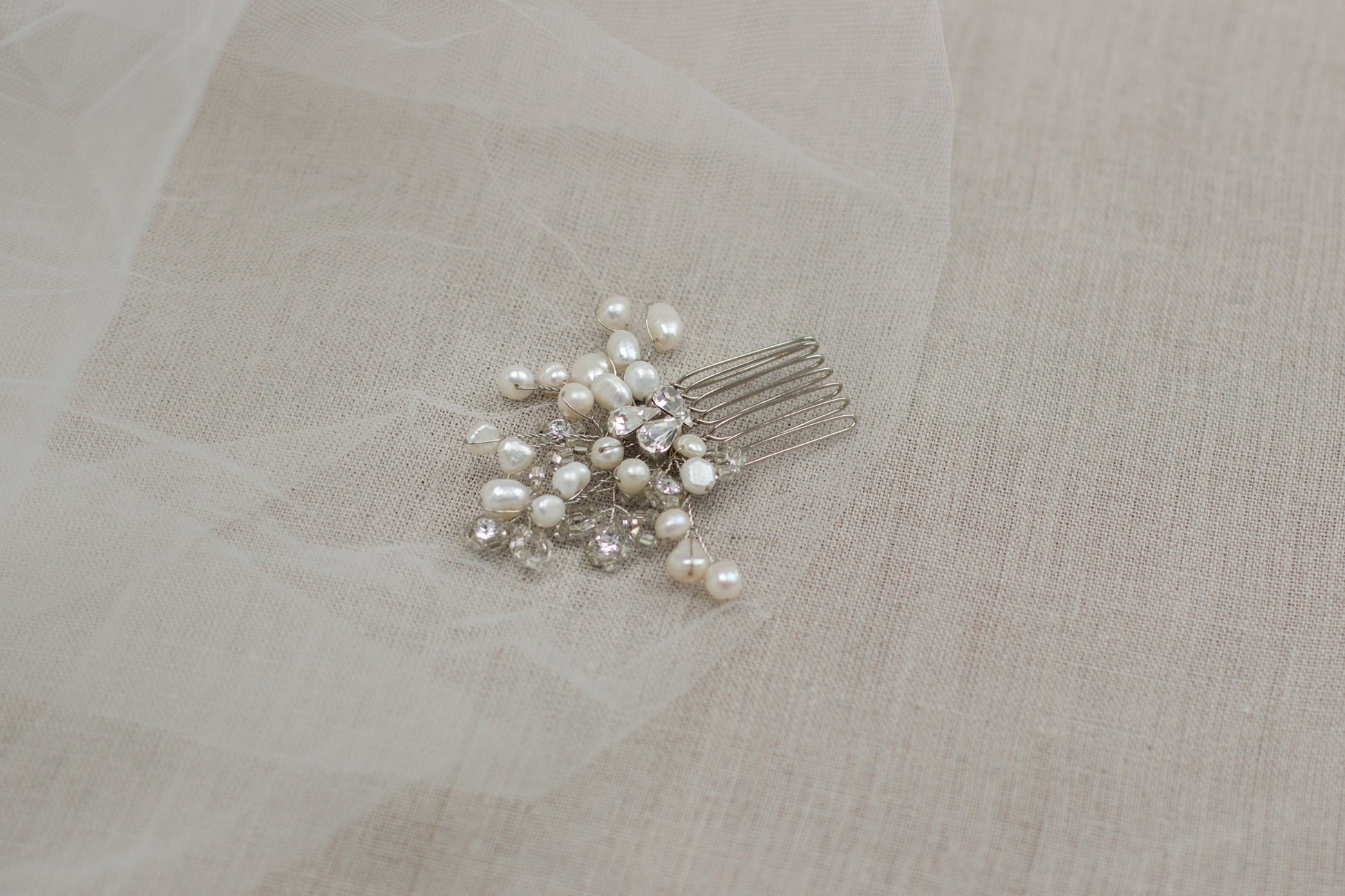 Check out our unique handmade wedding hair accessories at online bridal boutique in Europe. One of a kind bridal hair comb. Small pearl wedding headpiece. Freshwater pearl hair comb. Wedding hair piece features pearl twigs. Hair adornment.