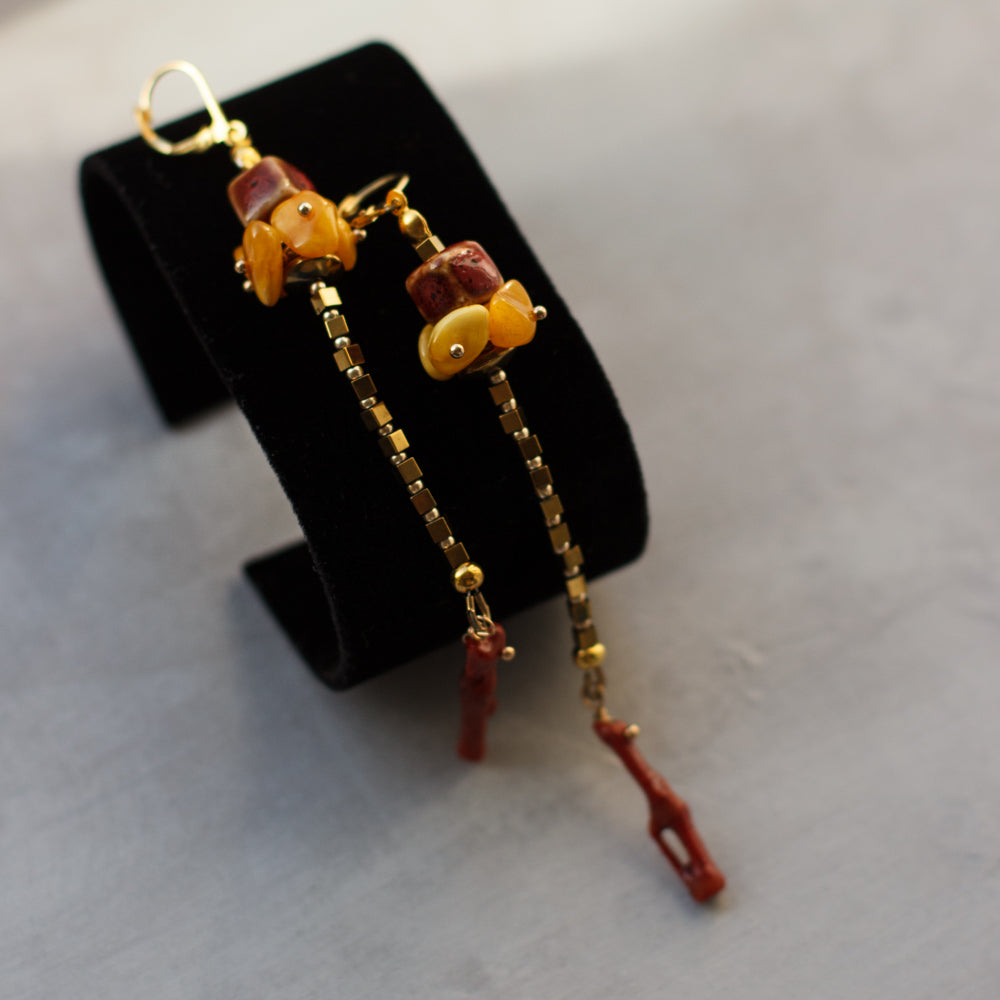 Long, light & bright unique fashion accessories. Amber earrings. Coral earrings. Geometric shapes jewelry. Gold, yellow, and red earrings. fashionable look for summer.