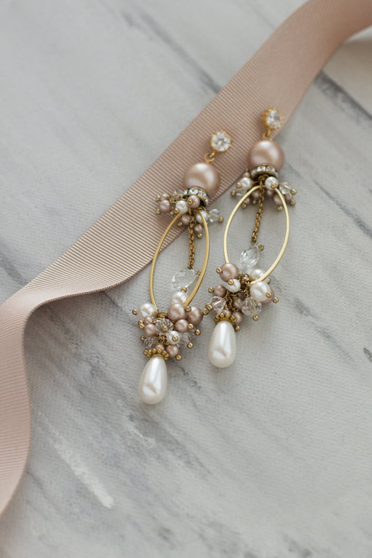 Gold earrings.  Long oval shape earrings.  Almond powder and ivory Swarovski pearl jewelry.  Crystal accessories. wedding jewelry. Long bridal pearl earrings