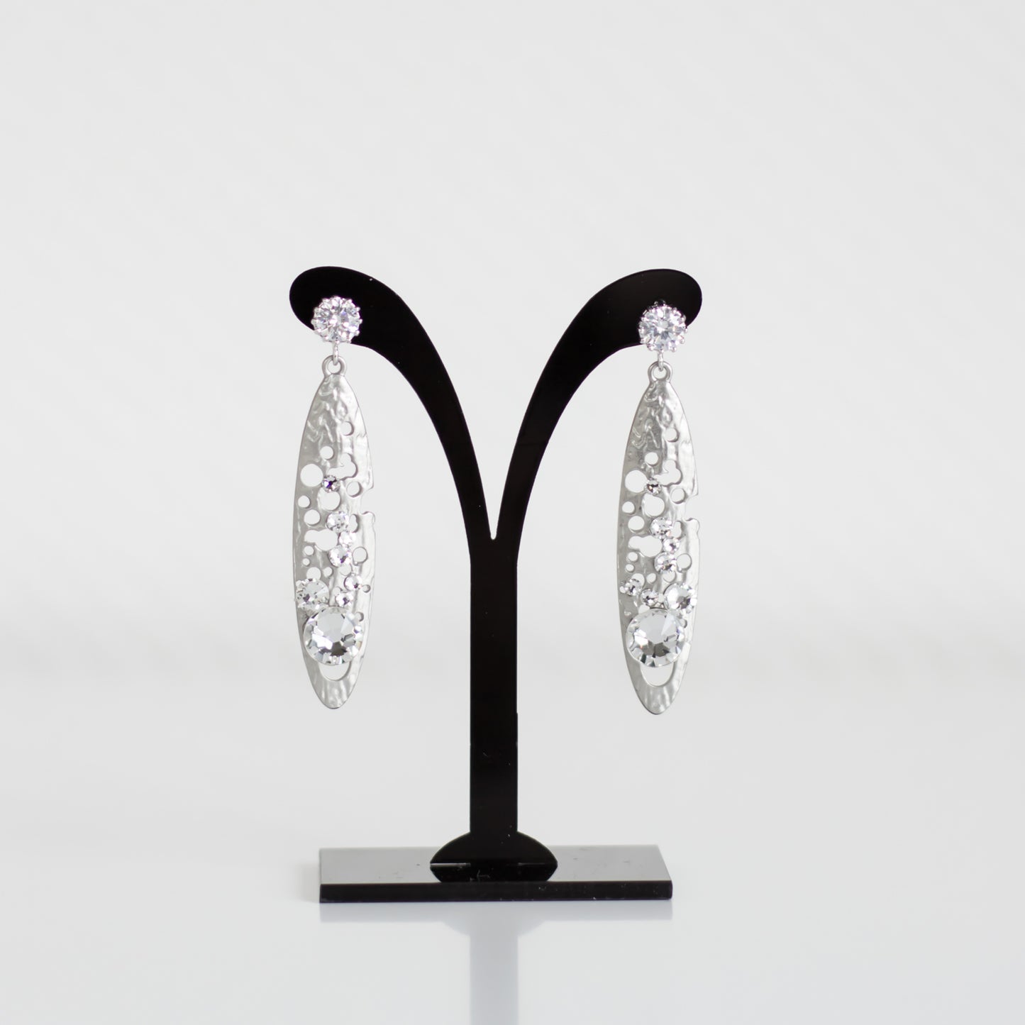 Shop handmade silver-plated dangle & drop earrings with cubic zirconia stud and oblong filigree crystal accents.