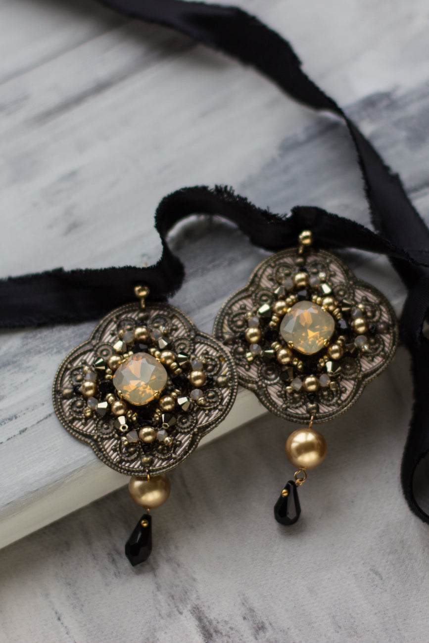 Shop hand-embroidered chandelier earrings in black, sand opal & gold. earrings.  Evening jewelry. Large crystal earrings. Handmade fashion accessories.