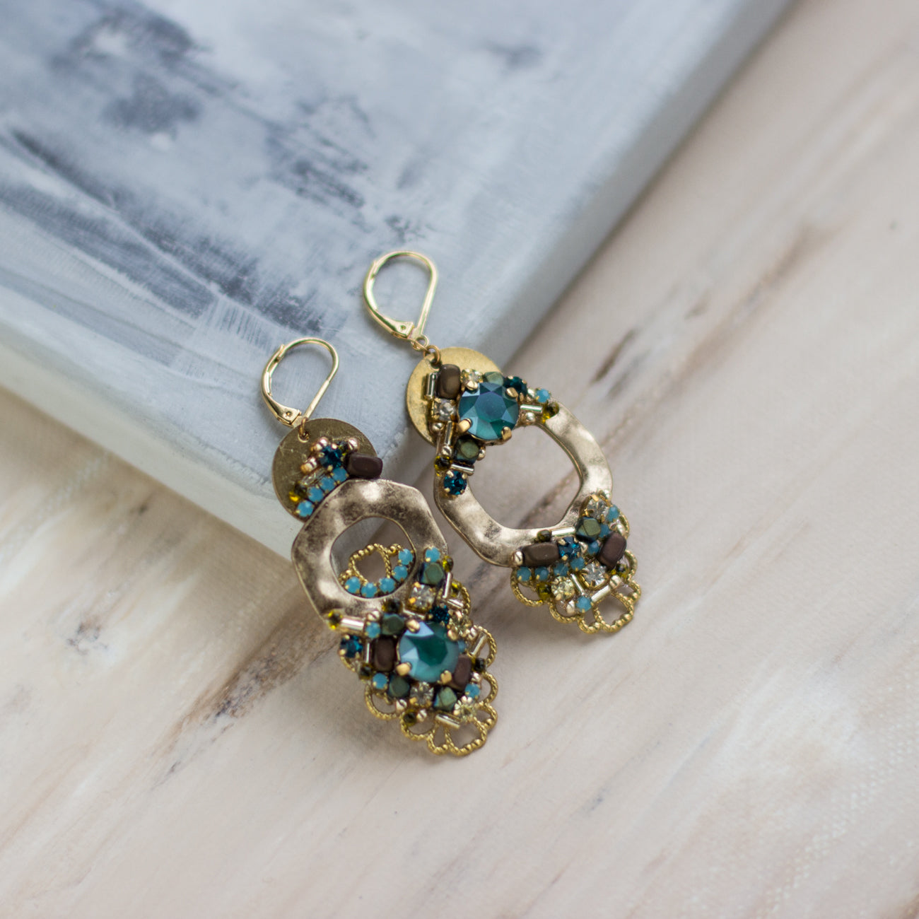 Gold green earrings. Green gold Evening earrings. asymmetric Woman jewelry. Crystal green gold earrings. Chic Rhinestone jewelry. Shop women's jewelry at LeFlowers Bijouterie to discover unique handmade pieces for your wardrobe. 