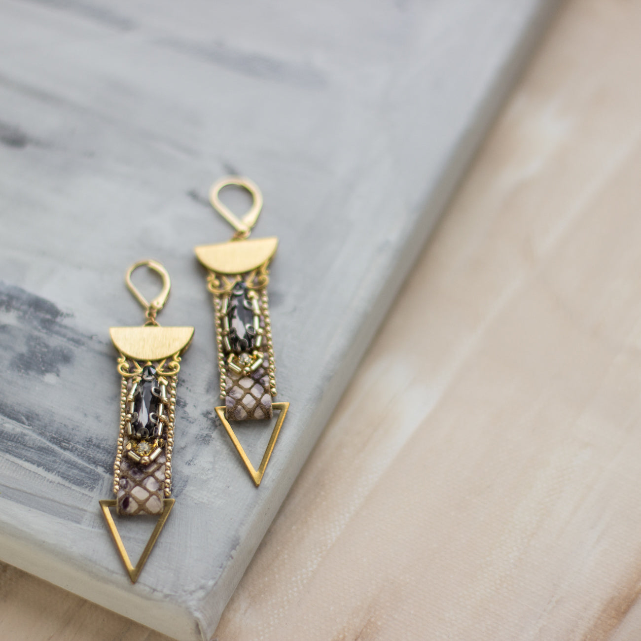 Shop women's jewelry at LeFlowers Bijouterie to discover unique handmade pieces for your wardrobe. Fancy geometric earrings. Gold earrings. Crystal earrings. Leather earrings. Snake skin earrings. OOAK jewelry. Handmade accessories
