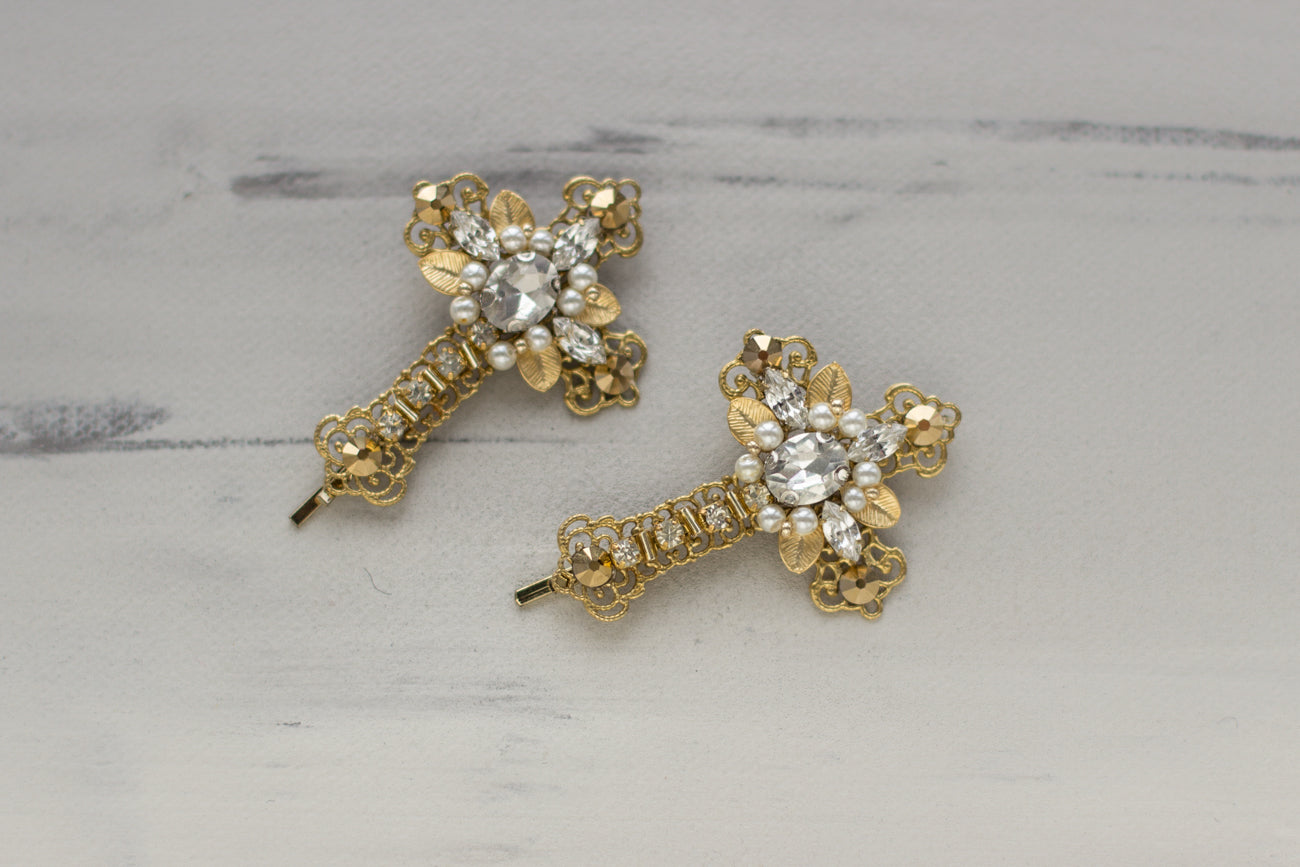 Explore our jewelry online and find the accessory for you. Cross headpiece. Gold hair pins. Handmade Hair accessories. Gold hairpiece. Hair pins crosses. Bridal Hair jewelry. wedding Hair accessories.