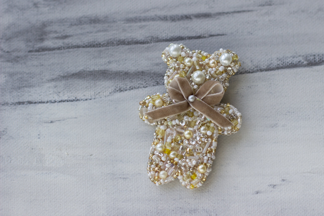 Shop women's jewelry at LeFlowers Bijouterie to discover unique handmade pieces for your wardrobe. Teddy bear brooch. Hand embroidered brooch. Yellow-Ivory brooch. Crystal-Pearl brooch. Bear accessories.